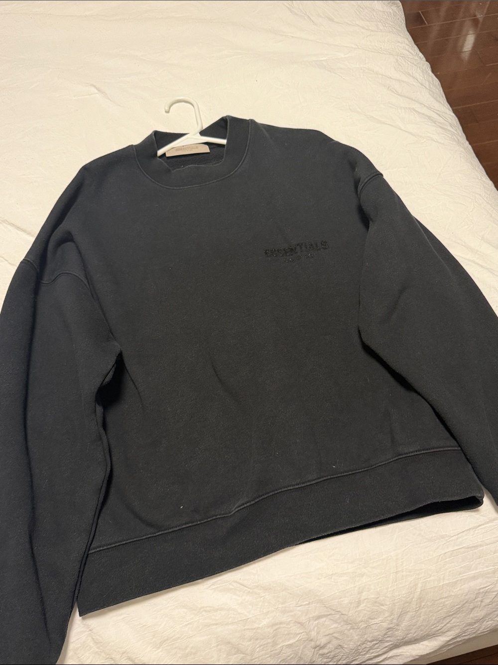 Essentials Black Crewneck Sweatshirt with Subtle Chest Logo
